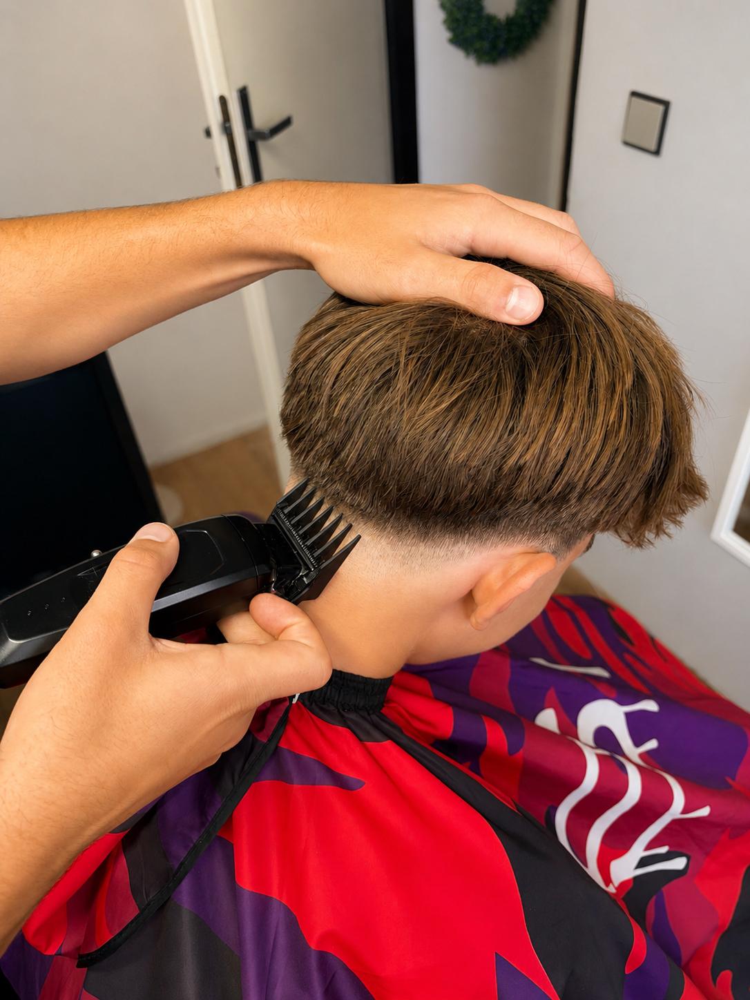 Barber při práci